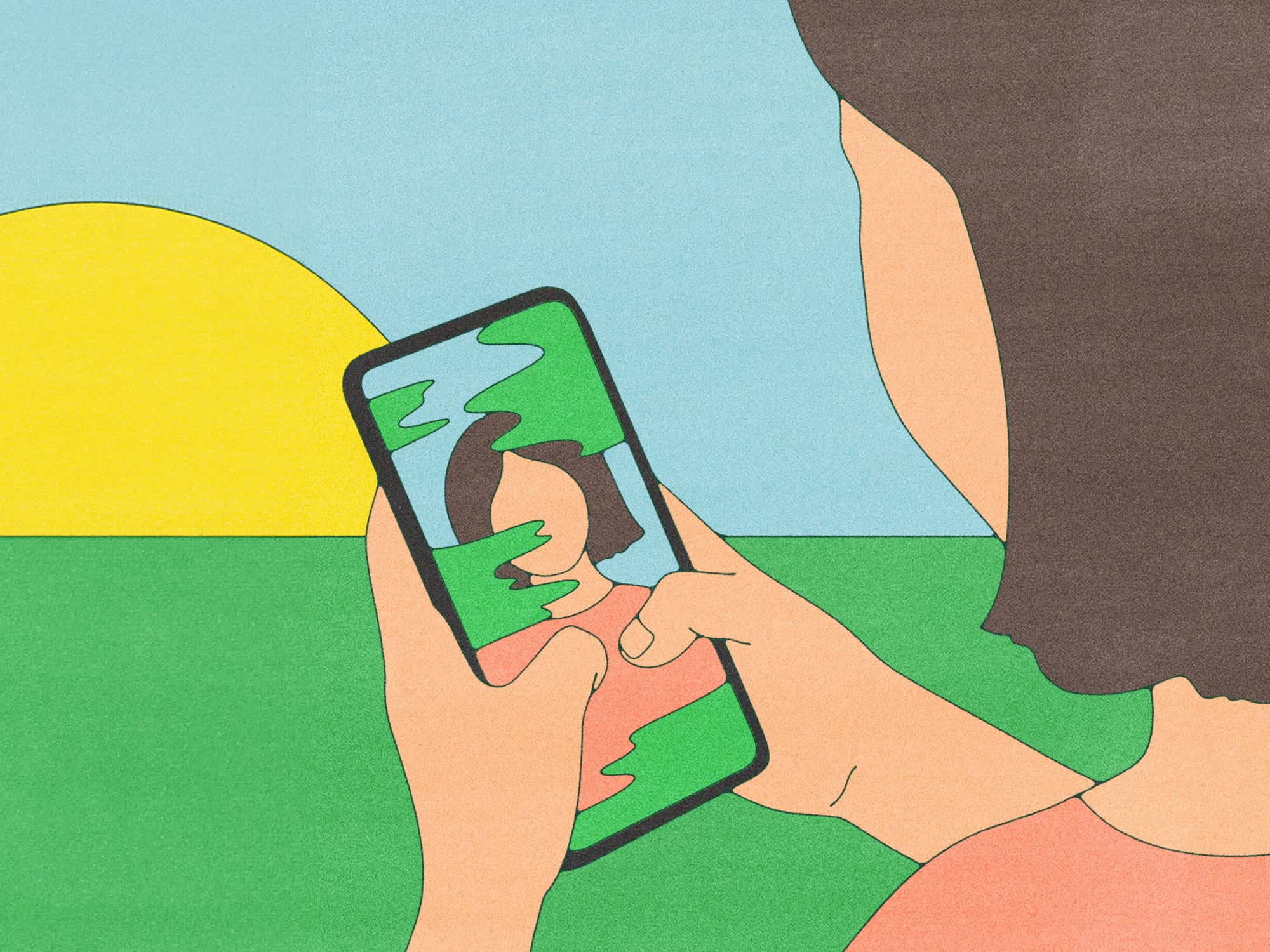 a woman holding a phone