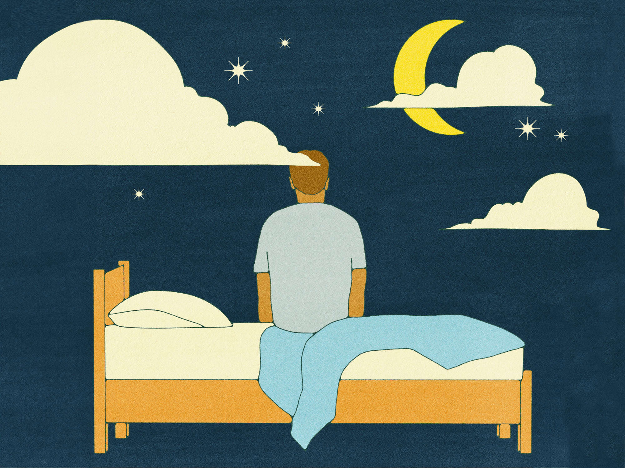 a man sitting on a bed looking at the moon and stars