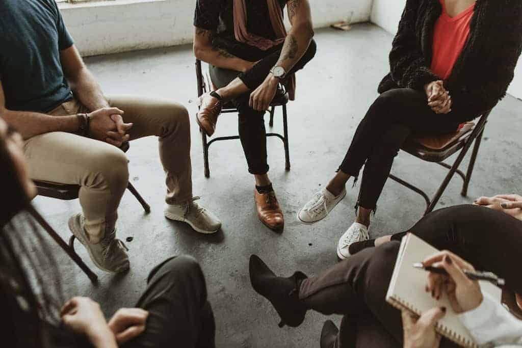 Diverse people in a IOP program session